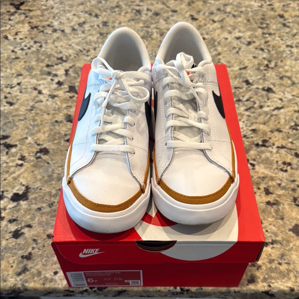 Nike White and Tan Sneakers with Black Swoosh